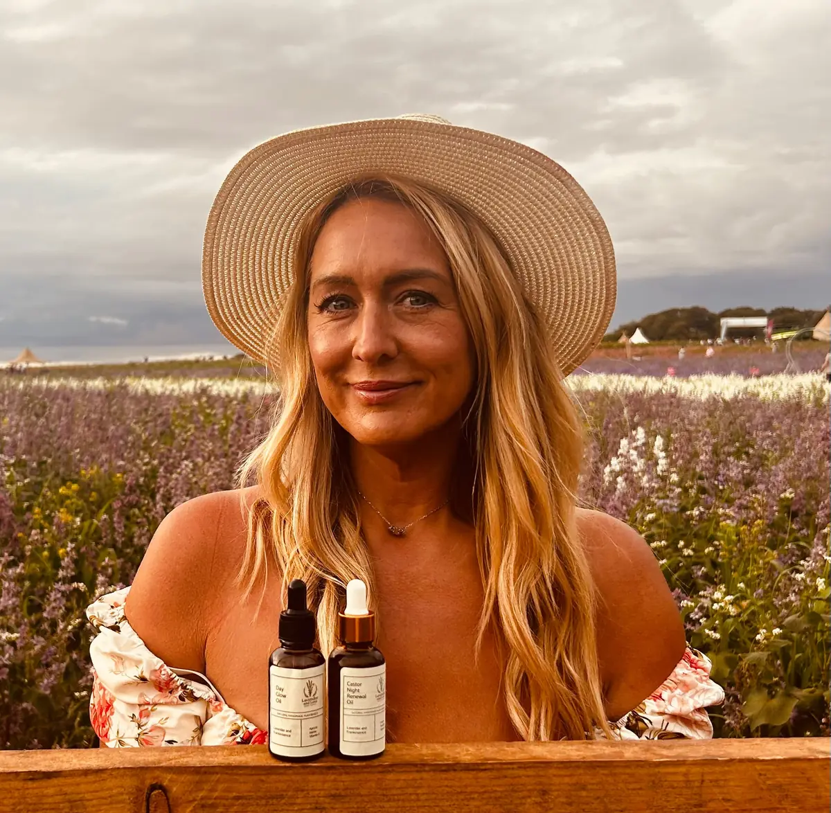 The maker of Lavender and Love in a lavender field, with Day Glow Oil and Castor Night Renewal Oil