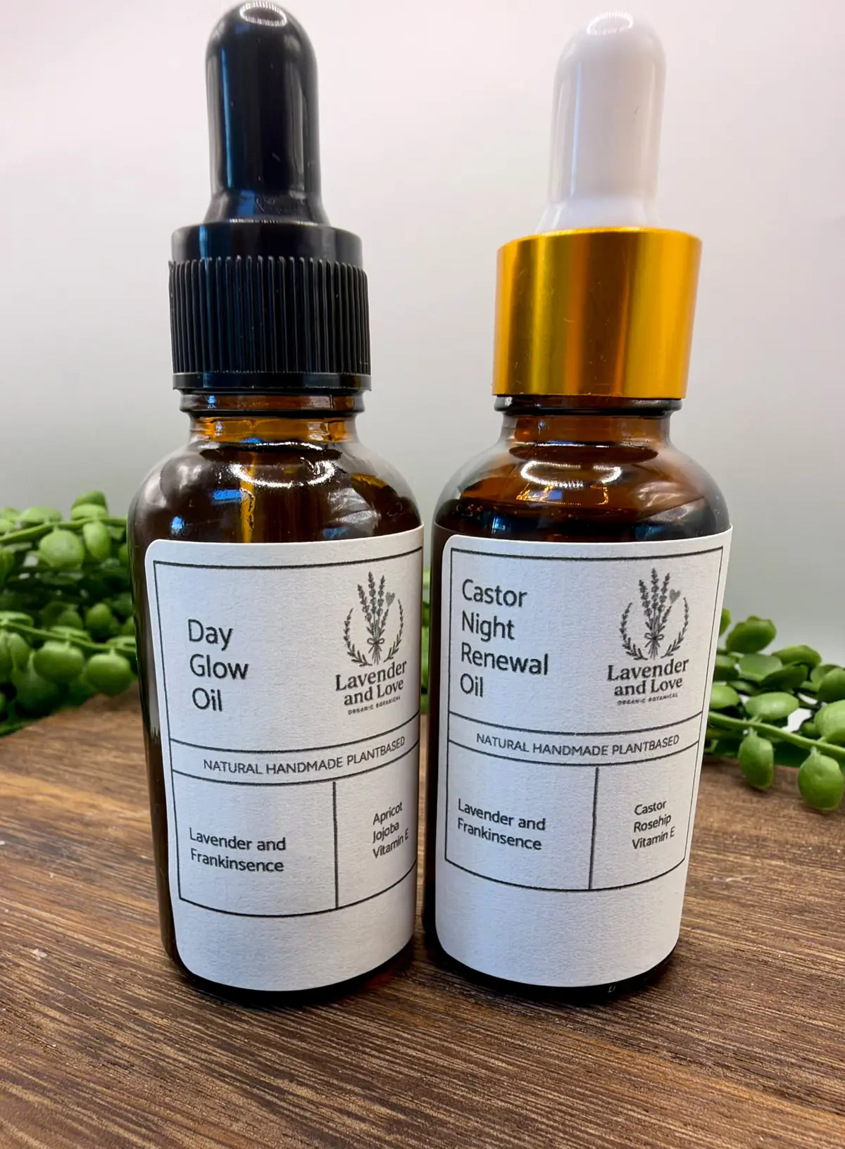 Day Glow Oil and Castor Night Renewal Oil in amber dropper bottles